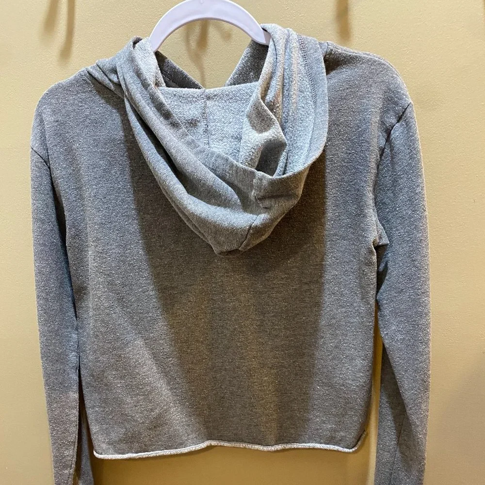 Adorable and stylish Justice cropped hooded sweatshirt size 14